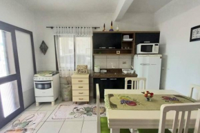 Apartamento térreo com garagem